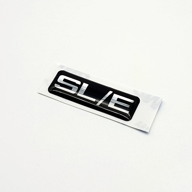 VH SLE GEL BADGE - HOLDCOM AUTO PARTS